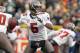Nov 20, 2011; Green Bay, WI, USA; Tampa Bay Buccaneers quarterback Josh Freeman (5) looks for a receiver during the game against the Green Bay Packers at Lambeau Field. The Packers won 35-26. Mandatory Credit: Mary Langenfeld-USA TODAY Sports