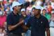 DUBLIN, OH - OCTOBER 03: Tiger Woods and Matt Kuchar of the U.S. Team celebrate after defeating the Cabrera/Leishman team 5&4 during the Day One Four-Ball Matches at the Muirfield Village Golf Club on October 3, 2013 in Dublin, Ohio. (Photo by Andy Lyons/Getty Images)