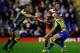 WARRINGTON, ENGLAND - JUNE 24: Josh Charnley (C) of Wigan in action Brett Hodgson and Richie Myler (R) of Warrington during the Super League match between Warrington Wolves and Wigan Warriors at the Halliwell Jones Stadium on June 24, 2013 in Warrington, England. (Photo by Paul Thomas/Getty Images)