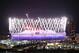 LONDON, ENGLAND - JULY 28: The Olympic Stadium is illuminated during the Opening Ceremony of the Olympic Games on July 28, 2012 in London, England. Athletes, heads of state and dignitaries from around the world have gathered in the Olympic Stadium for the opening ceremony of the 30th Olympiad. London plays host to the 2012 Olympic Games which will see 26 sports contested by 10,500 athletes over 17 days of competition. (Photo by Oli Scarff/Getty Images)