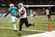 NEW ORLEANS, LA - SEPTEMBER 30: Running back Darren Sproles #43 of the New Orleans Saints scores on a 13-yard touchdown catch in the second quarter against the Miami Dolphins at the Mercedes-Benz Superdome on September 30, 2013 in New Orleans, Louisiana. (Photo by Chris Graythen/Getty Images)