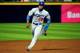 ATLANTA, GA - OCTOBER 03: Yasiel Puig #66 of the Los Angeles Dodgers runs to third base against the Atlanta Braves during Game One of the National League Division Series at Turner Field on October 3, 2013 in Atlanta, Georgia. (Photo by Scott Cunningham/Getty Images)