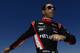 SONOMA, CA - AUGUST 23: Helio Castroneves of Brazil, driver of the #3 Team Penske Chevrolet Dallara, in the pits during practice for the IndyCar Series GoPro Grand Prix of Sonoma at the Sonoma Raceway on August 23, 2013 in Sonoma, California. (Photo by Robert Laberge/Getty Images)