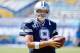 Sep 29, 2013; San Diego, CA, USA; Dallas Cowboys quarterback Tony Romo (9) stretchers before a game against the San Diego Chargers at Qualcomm Stadium. Mandatory Credit: Robert Hanashiro-USA TODAY Sports