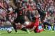LIVERPOOL, ENGLAND - OCTOBER 05: Luis Suarez of Liverpool scores the first goal during the Barclays Premier League match between Liverpool and Crystal Palace at Anfield on October 5, 2013 in Liverpool, England. (Photo by Clive Brunskill/Getty Images)