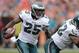 Sep 29, 2013; Denver, CO, USA; Philadelphia Eagles running back LeSean McCoy (25) rushes with the against the Denver Broncos in the third quarter at Sports Authority Field at Mile High. The Broncos won 52-20. Mandatory Credit: Ron Chenoy-USA TODAY Sports