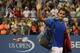 NEW YORK, NY - SEPTEMBER 02: Roger Federer of Switzerland waves to the crowd after being defeated by Tommy Robredo of Spain in the fourth round of the men's singles on Day Eight of the 2013 US Open at USTA Billie Jean King National Tennis Center on September 2, 2013 in the Flushing neighborhood of the Queens borough of New York City. (Photo by Clive Brunskill/Getty Images)