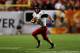 MIAMI GARDENS, FL - JANUARY 01: Jordan Lynch #6 of the Northern Illinois Huskies points as he looks to pass against the Florida State Seminoles during the Discover Orange Bowl at Sun Life Stadium on January 1, 2013 in Miami Gardens, Florida. (Photo by Streeter Lecka/Getty Images)