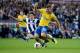 WEST BROMWICH, ENGLAND - OCTOBER 06: Jack Wilshere of Arsenal is challenged by Billy Jones of West Bromwich Albion during the Barclays Premier League match between West Bromwich Albion and Arsenal at The Hawthorns on October 6, 2013 in West Bromwich, England. (Photo by Michael Regan/Getty Images)