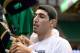 November 19, 2012; Salt Lake City, UT, USA; Utah Jazz center Enes Kanter (0) signs autographs prior to a game against the Houston Rockets at EnergySolutions Arena. Mandatory Credit: Russ Isabella-USA TODAY Sports