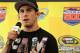 AVONDALE, AZ - NOVEMBER 11: Ultimate Fighting Championship Bantamweight fighter Dominick Cruz speaks to the media prior to the NASCAR Sprint Cup Series AdvoCare 500 at Phoenix International Raceway on November 11, 2012 in Avondale, Arizona. (Photo by Todd Warshaw/Getty Images for NASCAR)