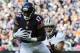 CHICAGO, IL - OCTOBER 06: Alshon Jeffery #17 of the Chicago Bears catches a pass in front of Chris Carr #31 of the New Orleans Saints during the first half on October 6, 2013 at Soldier Field in Chicago, Illinois. (Photo by David Banks/Getty Images)