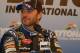 Jimmie Johnson smiles during media questioning before the 2013 season. Credit: Dwight Drum