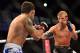 Oct 9, 2013; Barueri, Sao Paulo, Brazil; Raphael Assuncao (blue shorts) fights against TJ Dillashaw (black shorts) during UFC Fight Night 29 at Jose Correa Arena. Mandatory Credit: Jason Silva-USA TODAY Sports