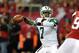 Oct 7, 2013; Atlanta, GA, USA; New York Jets quarterback Geno Smith (7) passes for a touchdown against the Atlanta Falcons during the second quarter at the Georgia Dome. Mandatory Credit: Dale Zanine-USA TODAY Sports