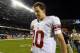 Oct 10, 2013; Chicago, IL, USA; New York Giants quarterback Eli Manning (10) leaves the field after the game against the Chicago Bears at Soldier Field. Chicago defeats New York 27-21. Mandatory Credit: Mike DiNovo-USA TODAY Sports