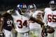 Oct 10, 2013; Chicago, IL, USA; New York Giants running back Brandon Jacobs (34) reacts after scoring a touchdown during the first half at Soldier Field. Mandatory Credit: Mike DiNovo-USA TODAY Sports