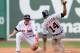 BOSTON, MA - SEPTEMBER 2: Austin Jackson #14 of the Detroit Tigers slides into second base as Stephen Drew #7 of the Boston Red Sox applies the tag late in the eighth inning at Fenway Park on September 2, 2013 in Boston, Massachusetts. The Tigers won 3-0. (Photo by Darren McCollester/Getty Images)