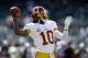OAKLAND, CA - SEPTEMBER 29: Robert Griffin III #10 of the Washington Redskins warms up before their game against the Oakland Raiders at O.co Coliseum on September 29, 2013 in Oakland, California. (Photo by Ezra Shaw/Getty Images)