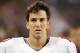 Oct 10, 2013; Chicago, IL, USA; New York Giants quarterback Eli Manning (10) stands on the sidelines during the first quarter against the New York Giants at Soldier Field. Mandatory Credit: Andrew Mills-USA TODAY Sports
