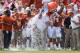 DALLAS, TX - OCTOBER 12: Head coach Mack Brown of the Texas Longhorns has a cooler of ice water dumped on him by his team after the Longhorns beat the Oklahoma Sooners 36-20 at the Cotton Bowl on October 12, 2013 in Dallas, Texas. (Photo by Tom Pennington/Getty Images)