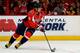 WASHINGTON, DC - OCTOBER 10: Alex Ovechkin #8 of the Washington Capitals skates with the puck during the second period of an NHL game against the Carolina Hurricanes at Verizon Center on October 10, 2013 in Washington, DC. (Photo by Patrick McDermott/NHLI via Getty Images)