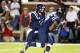 Oct 12, 2013; Oxford, MS, USA; Mississippi Rebels quarterback Bo Wallace (14) hands off the ball to Mississippi Rebels running back I'Tavius Mathers (5) during the game at Vaught-Hemingway Stadium. Mandatory Credit: Spruce Derden-USA TODAY Sports