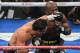 LAS VEGAS, NV - OCTOBER 12: Juan Manuel Marquez (L) throws a left at WBO welterweight champion Timothy Bradley Jr. in the 10th round of their bout at the Thomas & Mack Center on October 12, 2013 in Las Vegas, Nevada. Bradley won in a split decision. (Photo by Ethan Miller/Getty Images)