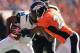 DENVER, CO - OCTOBER 13: Wide receiver Justin Blackmon #14 of the Jacksonville Jaguars makes a reception as cornerback Champ Bailey #24 of the Denver Broncos makes the tackle at Sports Authority Field at Mile High on October 13, 2013 in Denver, Colorado. (Photo by Doug Pensinger/Getty Images)