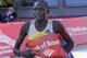 CHICAGO, IL - OCTOBER 13: Dennis Kimetto of Kenya wins the 2013 Bank of America Chicago Marathon in 2:03:45 on October 13, 2013 in Chicago, Illinois. (Photo by David Banks/Getty Images)