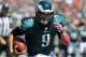 TAMPA, FL - OCTOBER 13: Quarterback Nick Foles #9 of the Philadelphia Eagles runs for a touchdown in the 1st quarter against the Tampa Bay Buccaneers October 13, 2013 at Raymond James Stadium in Tampa, Florida. (Photo by Al Messerschmidt/Getty Images)