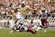 ORLANDO, FL - SEPTEMBER 28: Kadetrix Marcus #25 of the South Carolina Gamecocks trips up Blake Bortles #5 of the Central Florida Knights during a game at Bright House Networks Stadium on September 28, 2013 in Orlando, Florida. South Carolina won the game 28-25. (Photo by Stacy Revere/Getty Images)