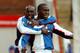 BLACKBURN, ENGLAND - FEBRUARY 28: Dwight Yorke of Blackburn congratulates Andy Cole on his goal during the FA Barclaycard Premiership match between Blackburn Rovers and Southampton at Ewood Park on February 28, 2004 in Blackburn, England. (Photo by Matthew Lewis/Getty Images)