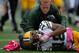 BALTIMORE, MD - OCTOBER 13: Randall Cobb #18 of the Green Bay Packers is attended to by a trainer after being injuired on a play in the second quarter during a game against the Baltimore Ravens at M&T Bank Stadium on October 13, 2013 in Baltimore, Maryland. (Photo by Patrick McDermott/Getty Images)