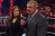 Stephanie McMahon and Triple H speak to the WWE Universe. (Photo credit: WWE.com)