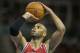 RIO DE JANEIRO, BRAZIL - OCTOBER 12: Taj Gibson #22 of the Chicago Bulls shoots a free throw during Chicago Bulls v Washington Wizards - NBA Global Games Rio 2013 at Arena HSBC on October 12, 2013 in Rio de Janeiro, Brazil. (Photo by Alexandre Loureiro/Getty Images)
