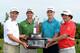 SOUTHAMPTON, BERMUDA - OCTOBER 15: Padraig Harrington of Ireland, Adam Scott of Australia, Justin Rose of England and Jason Dufner of the USA with the Grand Slam trophy during the first round of the PGA Grand Slam of Golf at Port Royal Golf Course on October 15, 2013 in Southampton, Bermuda. (Photo by Ross Kinnaird/Getty Images)