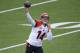 ORCHARD PARK, NY - OCTOBER 13: Andy Dalton #14 of the Cincinnati Bengals throws a pass during NFL game action against the Buffalo Bills at Ralph Wilson Stadium on October 13, 2013 in Orchard Park, New York. (Photo by Tom Szczerbowski/Getty Images)