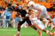 Oct 5, 2013; Syracuse, NY, USA; Syracuse Orange quarterback Terrel Hunt (10) is tackled by Clemson Tigers safety Robert Smith (27) and linebacker Stephone Anthony (42) during the third quarter at the Carrier Dome. Clemson defeated Syracuse 49-14. Mandatory Credit: Rich Barnes-USA TODAY Sports