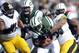 Oct 13, 2013; East Rutherford, NJ, USA; Pittsburgh Steelers outside linebacker LaMarr Woodley (56) sacks New York Jets quarterback Geno Smith (7) during the first half at MetLife Stadium. Mandatory Credit: Joe Camporeale-USA TODAY Sports