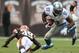 Oct 13, 2013; Cleveland, OH, USA; Detroit Lions wide receiver Calvin Johnson (81) is upended by Cleveland Browns free safety Tashaun Gipson (39) during the third quarter at FirstEnergy Stadium. Mandatory Credit: Ron Schwane-USA TODAY Sports
