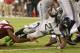 GLENDALE, AZ - OCTOBER 17: Running back Marshawn Lynch #24 of the Seattle Seahawks dives into the endzone to score on a 2 yard rushing touchdown against the Arizona Cardinals during the third quarter of the NFL game at the University of Phoenix Stadium on October 17, 2013 in Glendale, Arizona. (Photo by Christian Petersen/Getty Images)