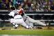 Oct 17, 2013; Detroit, MI, USA; Detroit Tigers catcher Alex Avila (13) holds onto the ball and tags out Boston Red Sox catcher David Ross (3) at home plate during the second inning in game five of the American League Championship Series baseball game at Comerica Park. Mandatory Credit: Rick Osentoski-USA TODAY Sports