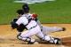DETROIT, MI - OCTOBER 17: David Ross #3 of the Boston Red Sox is out at home by Alex Avila #13 of the Detroit Tigers in the second inning of Game Five of the American League Championship Series at Comerica Park on October 17, 2013 in Detroit, Michigan. (Photo by Ronald Martinez/Getty Images)