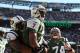 Oct 20, 2013; East Rutherford, NJ, USA; New York Jets quarterback Geno Smith (7) celebrates his touchdown run during the second half of their game against the New England Patriots at MetLife Stadium. Mandatory Credit: Ed Mulholland-USA TODAY Sports