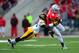 Oct 19, 2013; Columbus, OH, USA; Ohio State Buckeyes wide receiver Devin Smith (9) is tackled by Iowa Hawkeyes defensive back Desmond King (14) during the fourth quarter at Ohio Stadium. Mandatory Credit: Andrew Weber-USA TODAY Sports