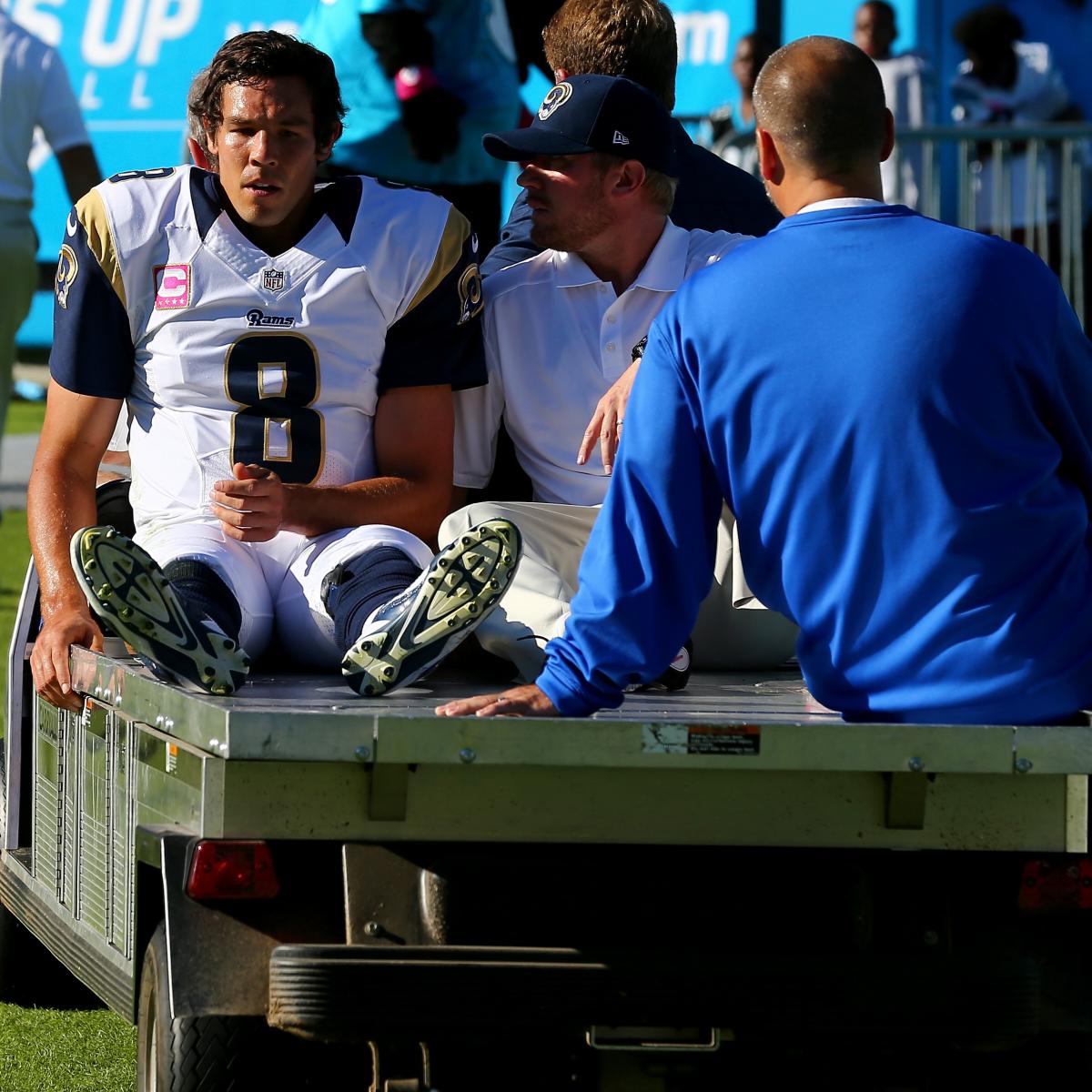 St. Louis Rams quarterback Sam Bradford enters the game for the first time,  clapping as he tries to get his team fired up against the Minnesota Vikings  in the second quarter of