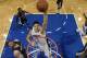 ORLANDO, FL - OCTOBER 18: Nikola Vucevic #9 of the Orlando Magic dunks against the Memphis Grizzlies during the game on October 18, 2013 at Amway Center in Orlando, Florida. NOTE TO USER: User expressly acknowledges and agrees that, by downloading and or using this photograph, User is consenting to the terms and conditions of the Getty Images License Agreement. Mandatory Copyright Notice: Copyright 2013 NBAE (Photo by Fernando Medina/NBAE via Getty Images)