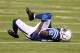 Oct 20, 2013; Indianapolis, IN, USA; Indianapolis Colts wide receiver Reggie Wayne (87) reacts after sustaining an injury against the Denver Broncos in the 2nd half during the game at Lucas Oil Stadium. Mandatory Credit: Brian Spurlock-USA TODAY Sports