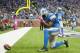 DETROIT, MI - OCTOBER 20: Tight end Brandon Pettigrew #87 of the Detroit Lions celebrates after he ran in a touchdown during the first half against the Cincinnati Bengals at Ford Field on October 20, 2013 in Detroit, Michigan. (Photo by Jason Miller/Getty Images)